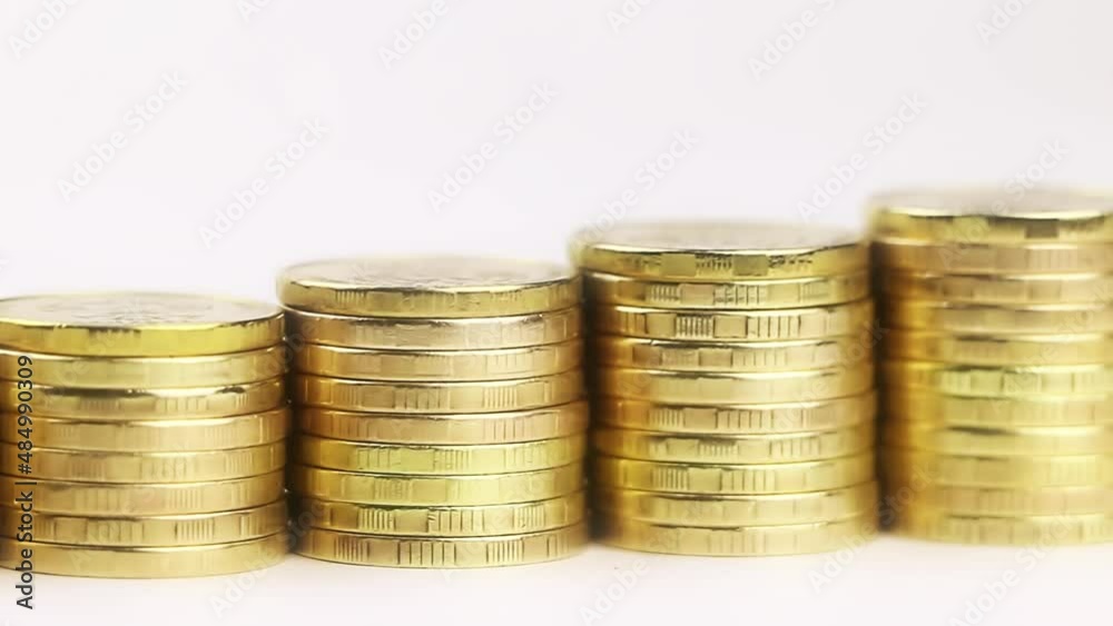 A stack of gold coins isolated on a white background.Money on a white background.Finance and money