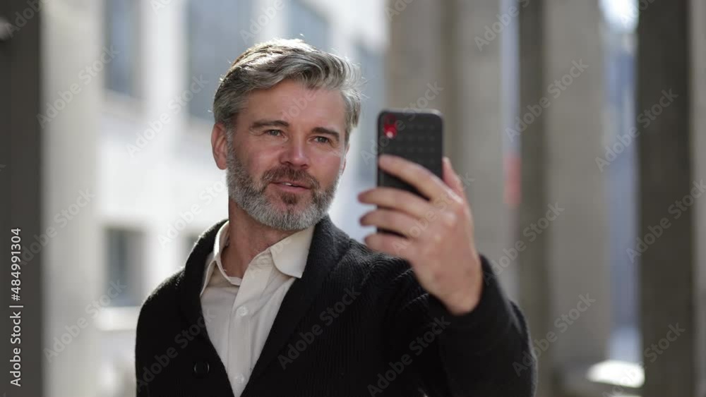 technology, communication and people concept - happy man with smartphone calling on city street technology, communication and people concept - happy man with smartphone calling on city street