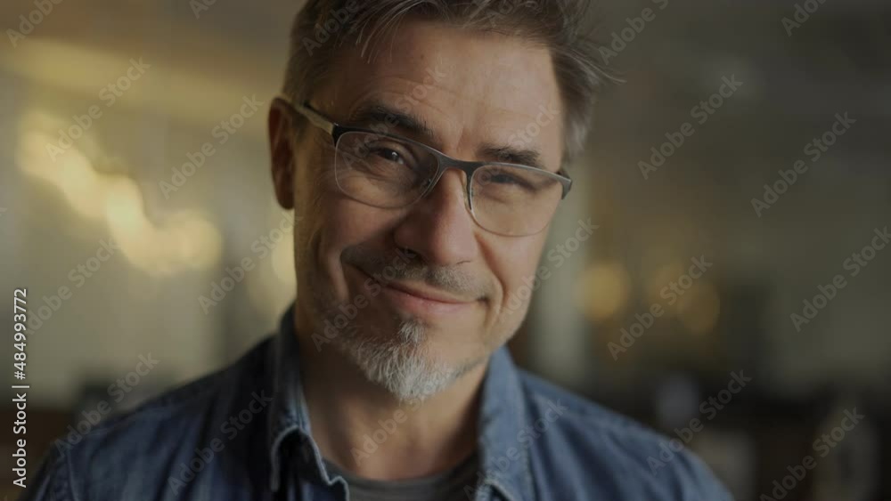 Portrait of of happy casual middle age casual man in glasses, smiling. Portrait of of happy casual middle age casual man in glasses, smiling.