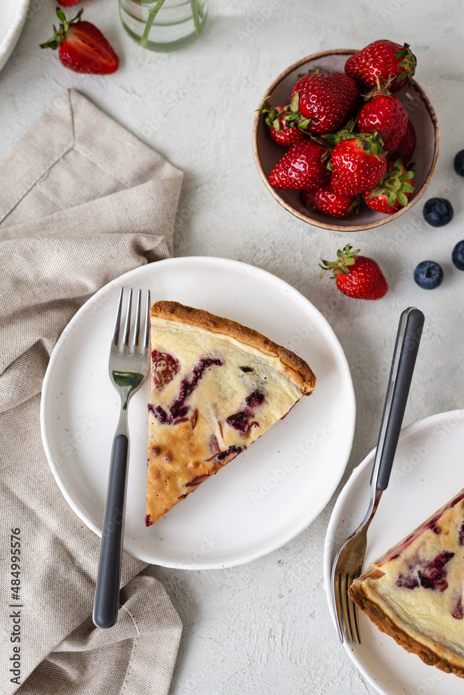 French quiche with strawberries. Traditional French pie. Open berries pie. Seasonal berries