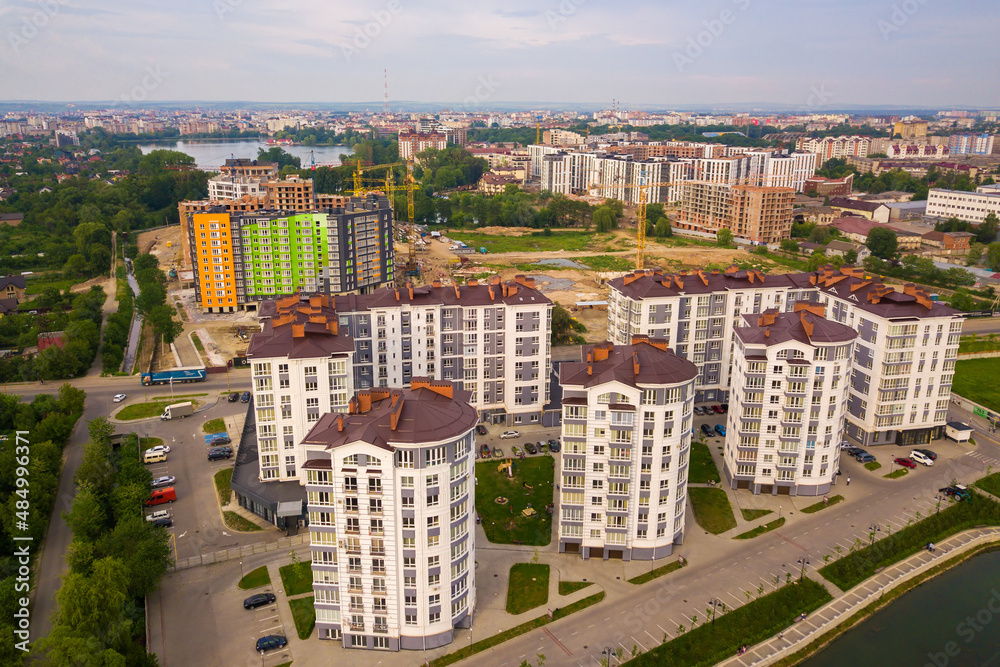 Aerial view of city residential area with high apartment buildings.