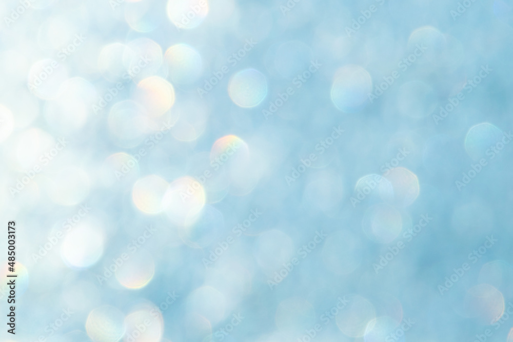 bright glitter background: bokeh effect from many colored lights on frozen glass, toning bright glitter background: bokeh effect from many colored lights on frozen glass, toning