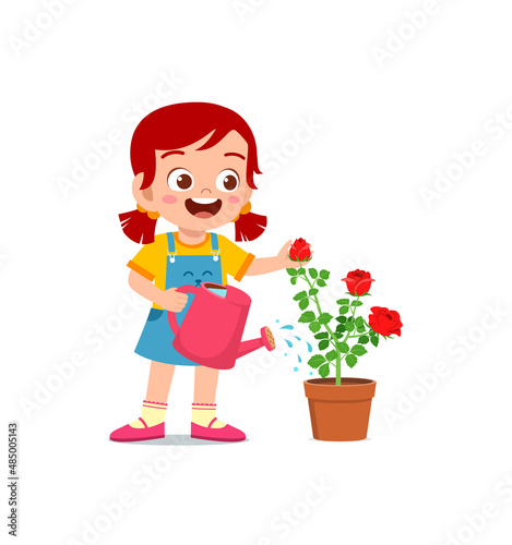 cute little girl stand and watering rose flower