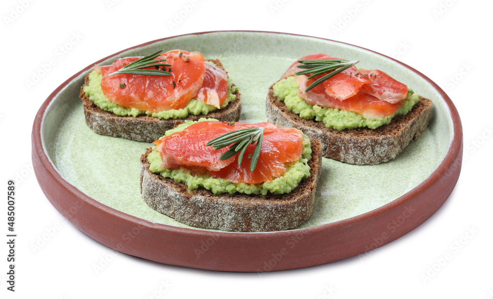 Delicious sandwiches with salmon, avocado and rosemary on white background