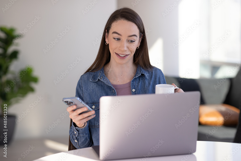 Caucasian woman at home remote working on laptop computer talking to her colleague Caucasian woman at home remote working on laptop computer talking to her colleague