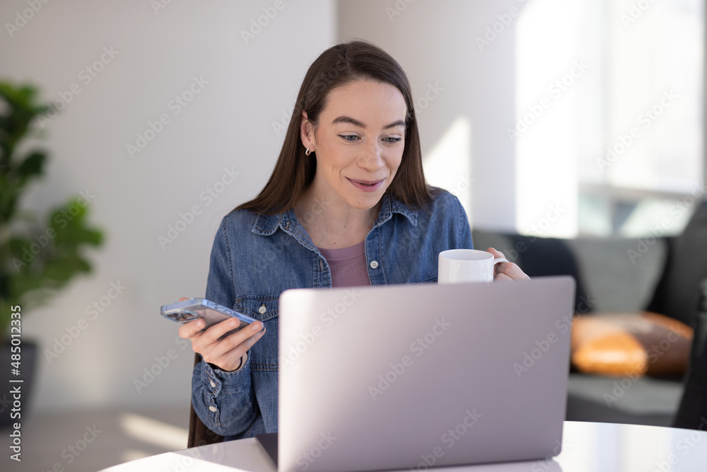 Caucasian woman at home remote working on laptop computer talking to her colleague Caucasian woman at home remote working on laptop computer talking to her colleague
