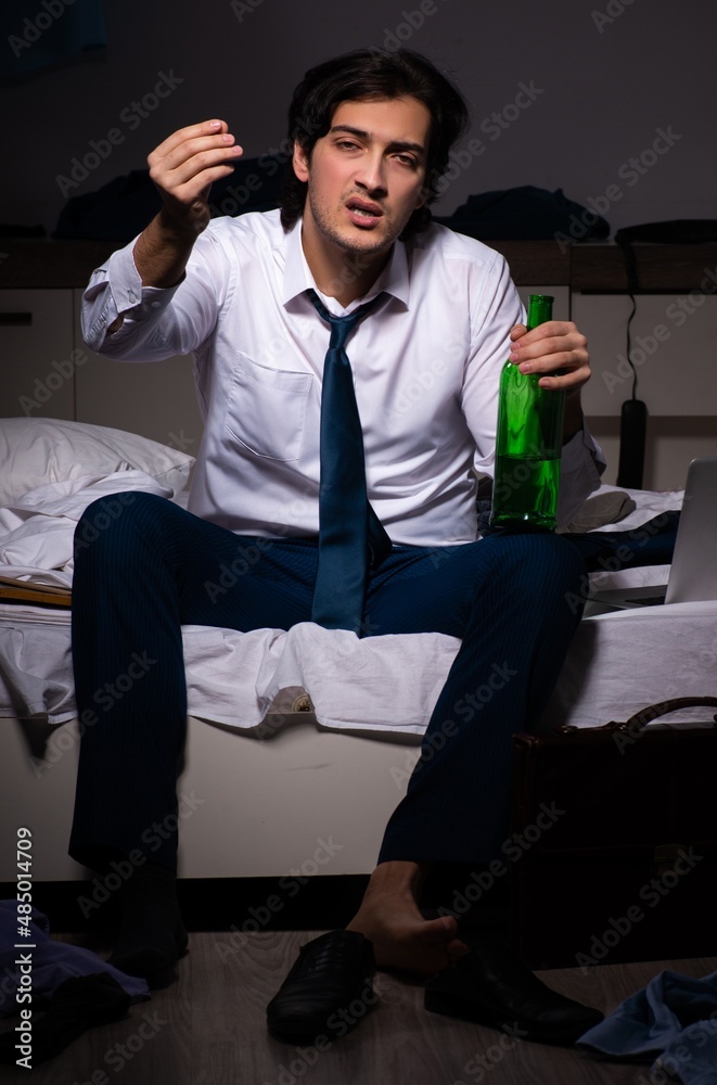 Young employee working at home after night shift Young employee working at home after night shift