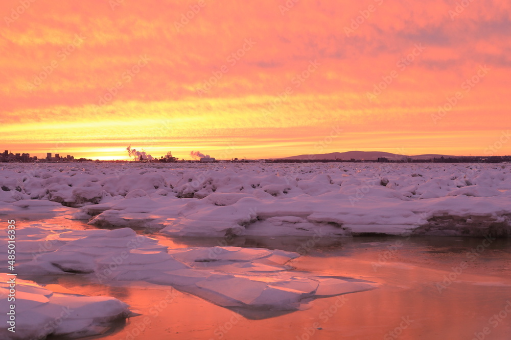 frozen sea sunset ice and snow