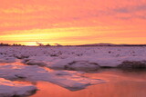 frozen sea sunset ice and snow