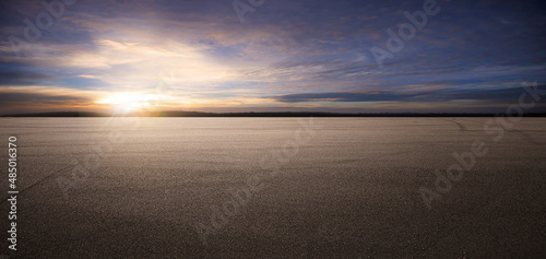 Fototapeta Naklejka Na Ścianę i Meble -  Panorama empty asphalt road and tarmac floor. Dramatic sunset sky
