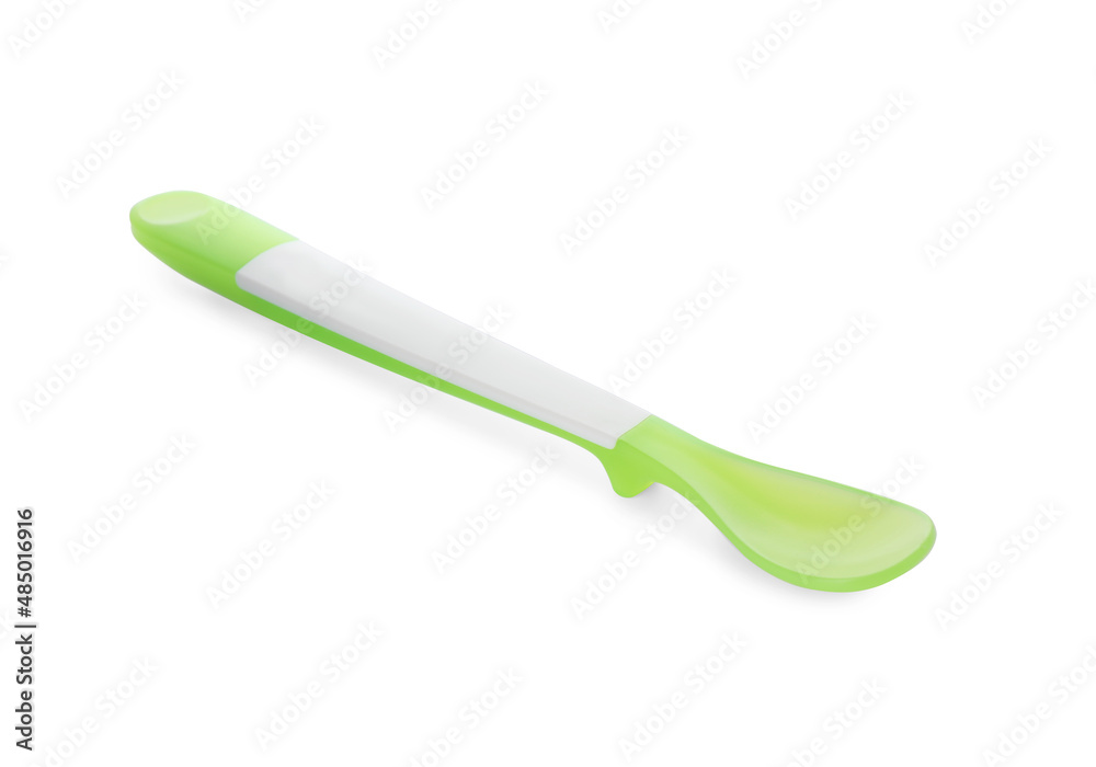 Plastic spoon isolated on white. Serving baby food Plastic spoon isolated on white. Serving baby food