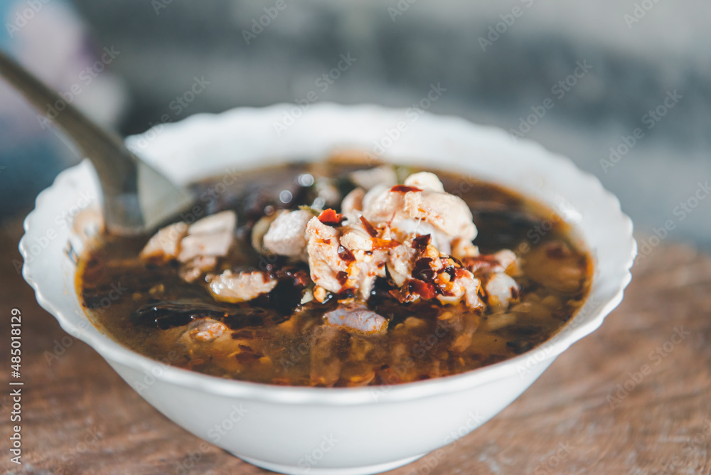 Hot and sour meat soup (Tom Yum) pork or chicken Hot and sour meat soup (Tom Yum) pork or chicken