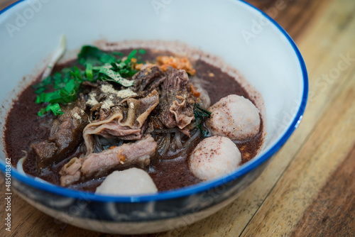 Braised beef clear noodle with meat ball soup stew