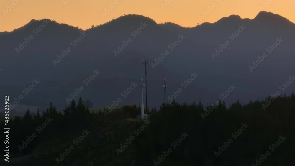 Aerial: Cell Phone Antenna Tower high on a hill Aerial: Cell Phone Antenna Tower high on a hill