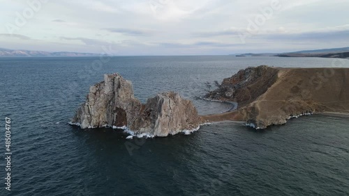 shamanka rock near cape burkhan on olzhon island on lake baikal photo