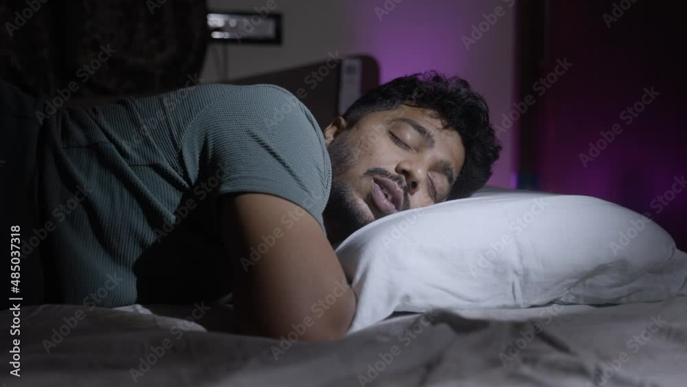 young man having nice comfortable sleep at time - concept of healthy lifestyle, relaxation and taking nap young man having nice comfortable sleep at time - concept of healthy lifestyle, relaxation and taking nap