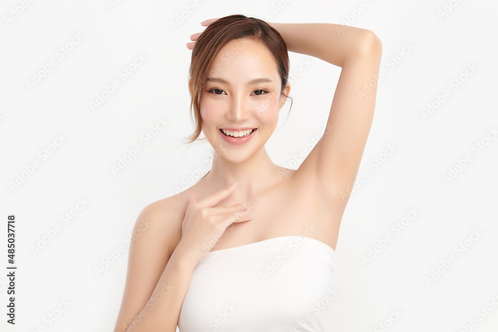 Beautiful Young Asian woman lifting hands up to show off clean and hygienic armpits or underarms on white background, Smooth armpit cleanliness and protection concept Beautiful Young Asian woman lifting hands up to show off clean and hygienic armpits or underarms on white background, Smooth armpit cleanliness and protection concept