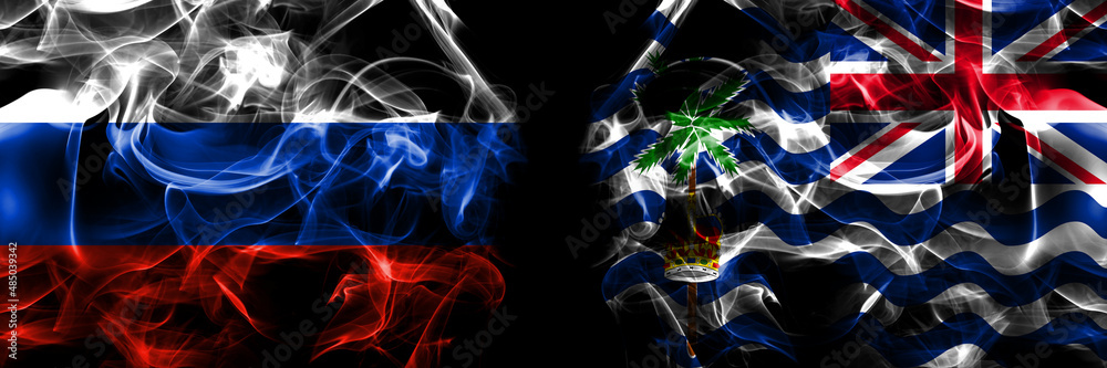 Russia, Russian vs British, Britain, Indian Ocean Territory flags. Smoke flag placed side by side isolated on black background