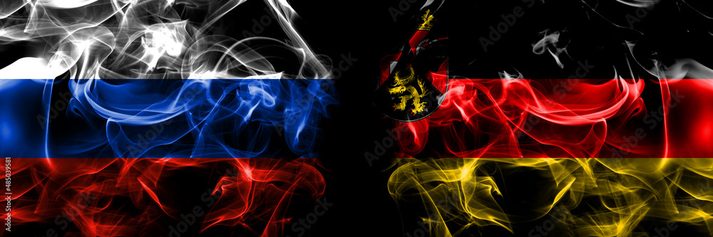 Russia, Russian vs Germany Rhineland Palatinate flags. Smoke flag placed side by side isolated on black background