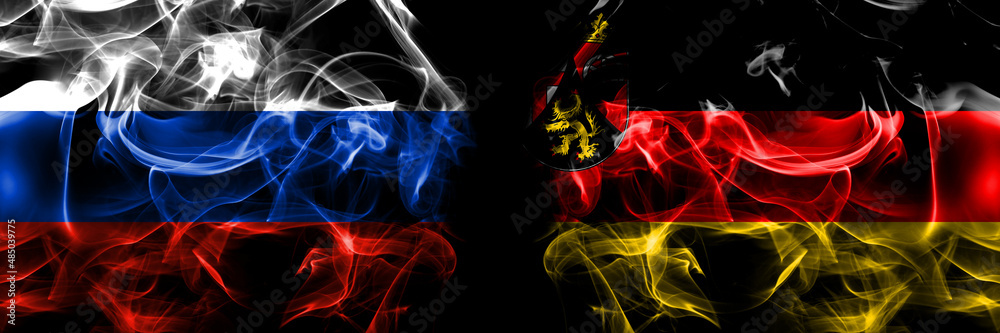 Obraz premium Russia, Russian vs Germany, Rhineland, Palatinate flags. Smoke flag placed side by side isolated on black background