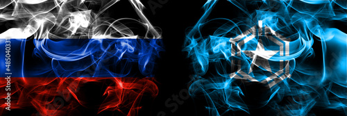 Russia, Russian vs Japan, Japanese, Obira, Hokkaido, Rumoi, Subprefecture flags. Smoke flag placed side by side isolated on black background