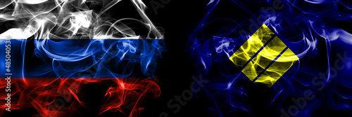 Russia, Russian vs Japan, Japanese, Takikawa, Hokkaido, Sorachi, Subprefecture flags. Smoke flag placed side by side isolated on black background photo