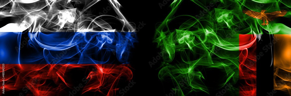 Russia, Russian vs Zambia, Zambian flags. Smoke flag placed side by side isolated on black background