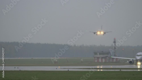 Aeroflot airplane landing on wet runway, Moscow photo