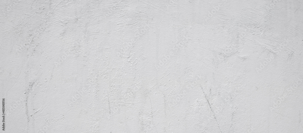 Gray concrete wall background. The old surface has an interesting pattern. background for design. Gray concrete wall background. The old surface has an interesting pattern. background for design.