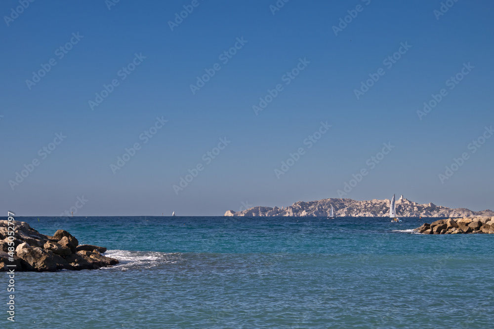 sailing boat seen from the Prado beach in Marseille sailing boat seen from the Prado beach in Marseille