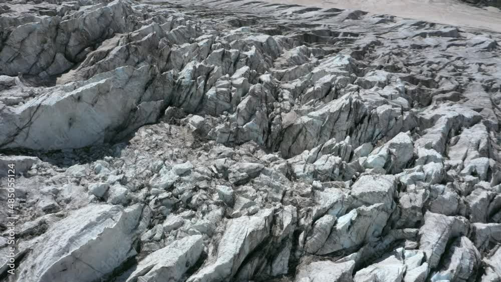 A frozen glacier surface. A torn ice texture of the icefall relief A frozen glacier surface. A torn ice texture of the icefall relief
