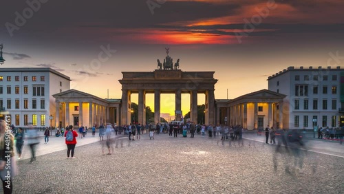 Day to night Time Lapse of brandenburg gate with morning traffic, Berlin, Germany photo