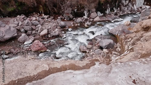 Up view of Adylsu river in Adylsu valley in Elbrus region. Russian severe and beautiful nature.