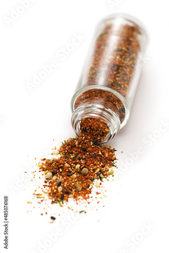 Shichimi Togarashi (aromatic spices that are indispensable for Japanese cuisine)spilled from the bottle.
A mixture of dried chili pepper and other seasonings. This is homemade. photo