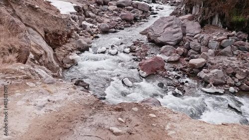 Up view of Adylsu river in Adylsu valley in Elbrus region. Russian severe and beautiful nature.