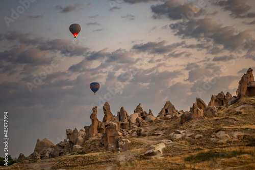 Cappadocia, Turkey – November 2020. an early morning take-off of a hot air balloon over idyllic Cappadocia