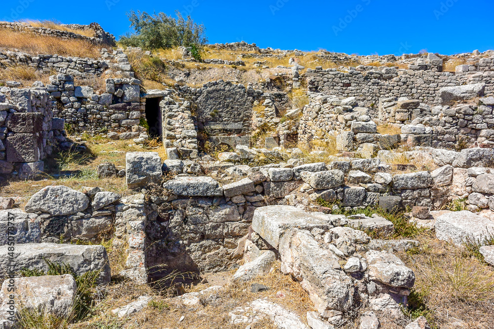Ancient Thera housing ruins. Ancient city remains at the Messavouno (Mésa Vounó) mountain on Santorini island, Greece.