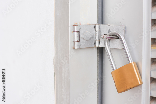 golden lock with metal door texture background