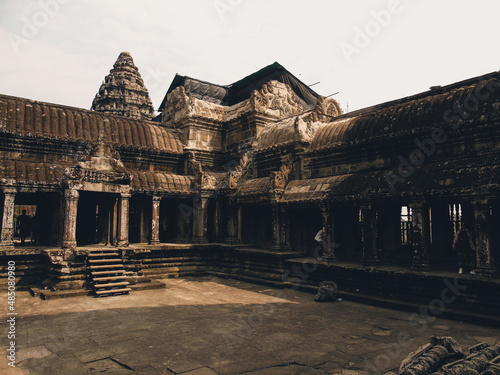 Ruins of an ancient stone temple lost in the Cambodian jungle - Angkor wat of Angkor temples