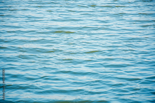 The surface of the water is blue in the evening.