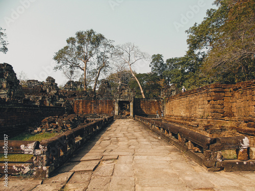 Ruins of an ancient stone temple lost in the Cambodian jungle - Preah Palilay of Angkor temples photo