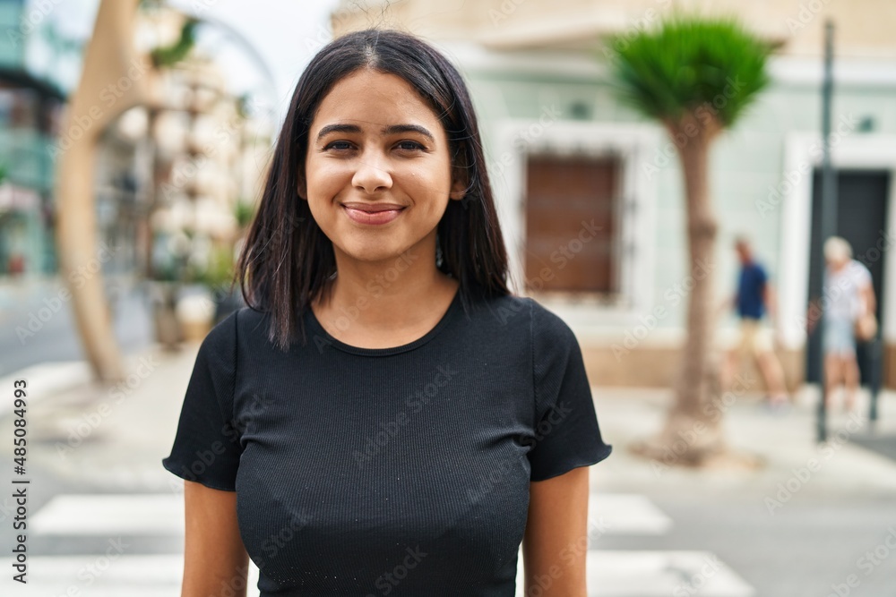Young latin woman smiling confident standing at street Young latin woman smiling confident standing at street