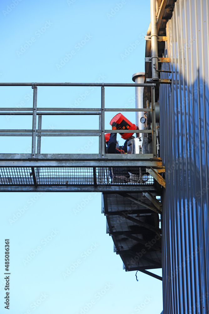 Workers conduct patrol inspection outside the anaerobic fermentation tank, North China