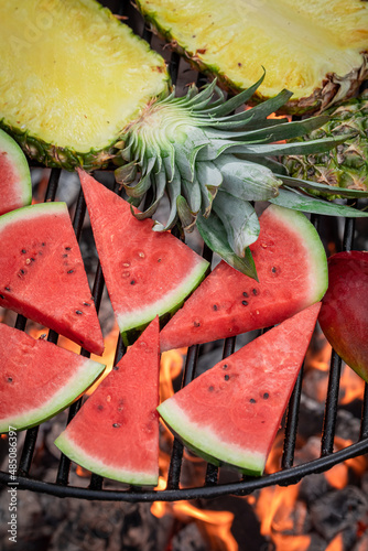 Hot roasted watermelon and pineapple with herbs and spices.