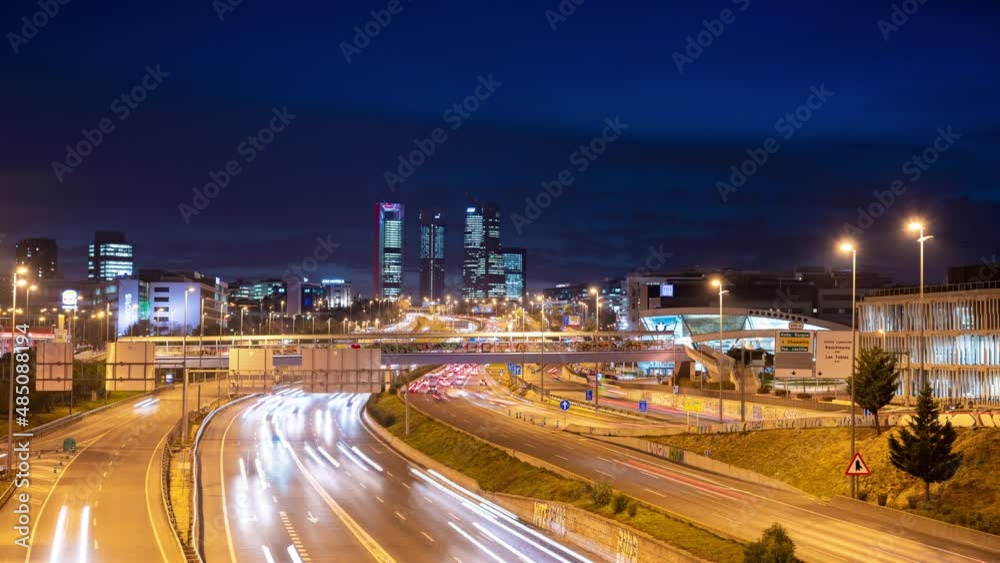 Timelapse Madrid Skyline at night with Four Towers in the background and traffic Timelapse Madrid Skyline at night with Four Towers in the background and traffic