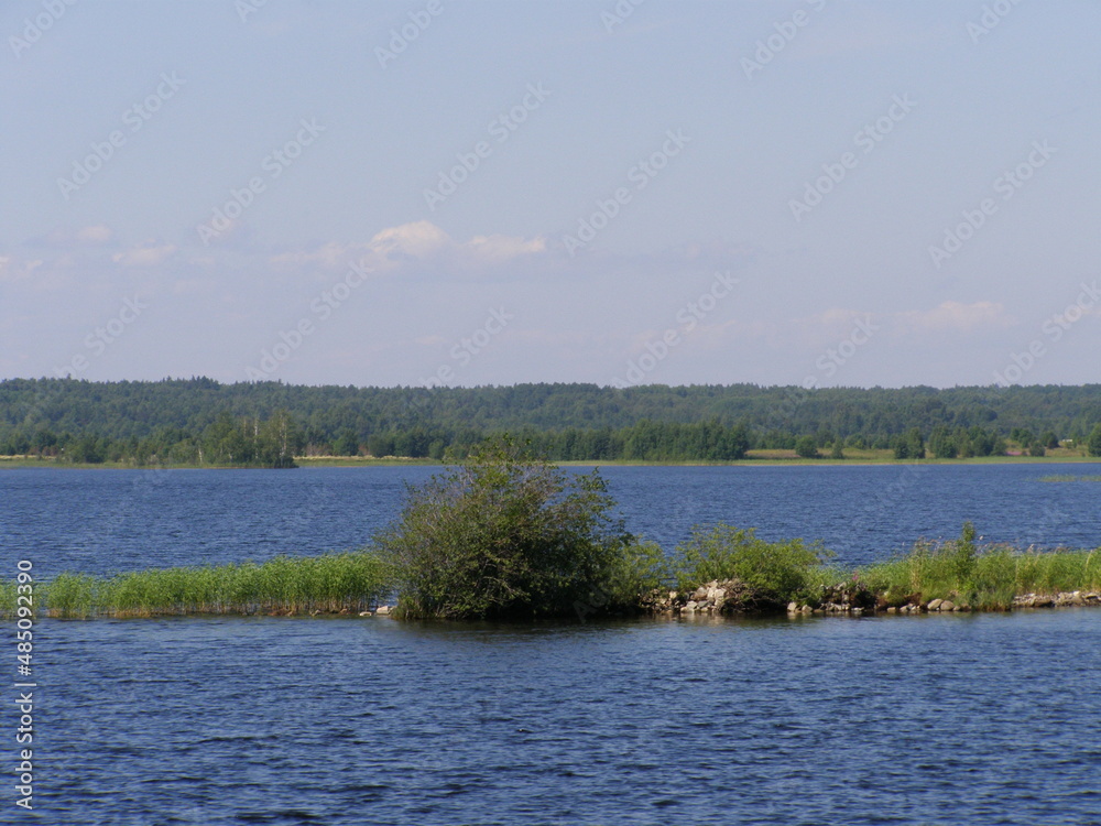 small island in the middle of a lake small island in the middle of a lake