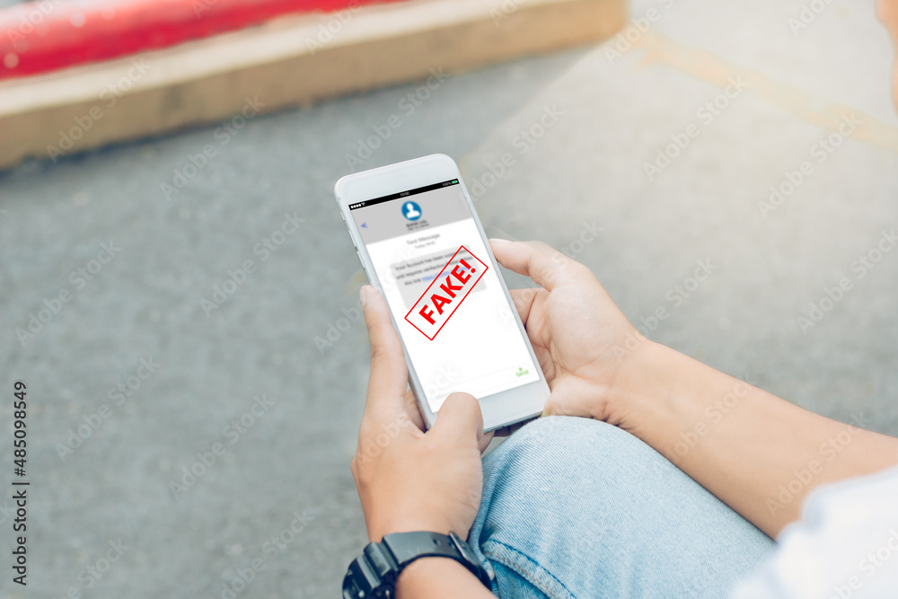 Fotografia Fake Text message SMS scam or phishing concept