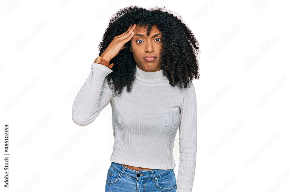 Young african american girl wearing casual clothes worried and stressed about a problem with hand on forehead, nervous and anxious for crisis Young african american girl wearing casual clothes worried and stressed about a problem with hand on forehead, nervous and anxious for crisis