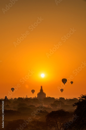 Bagan is an ancient with many pagoda of historic buddhist temples and stupas in Myanmar. The pagoda is being repaired from the earthquake. space for text. vertical.
