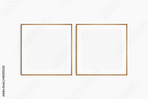 Frame mockup 1:1 square. Set of two thin cherry wood frames. Clean, modern, minimalist, bright gallery wall mockup, set of 2 square frames with a mat opening.